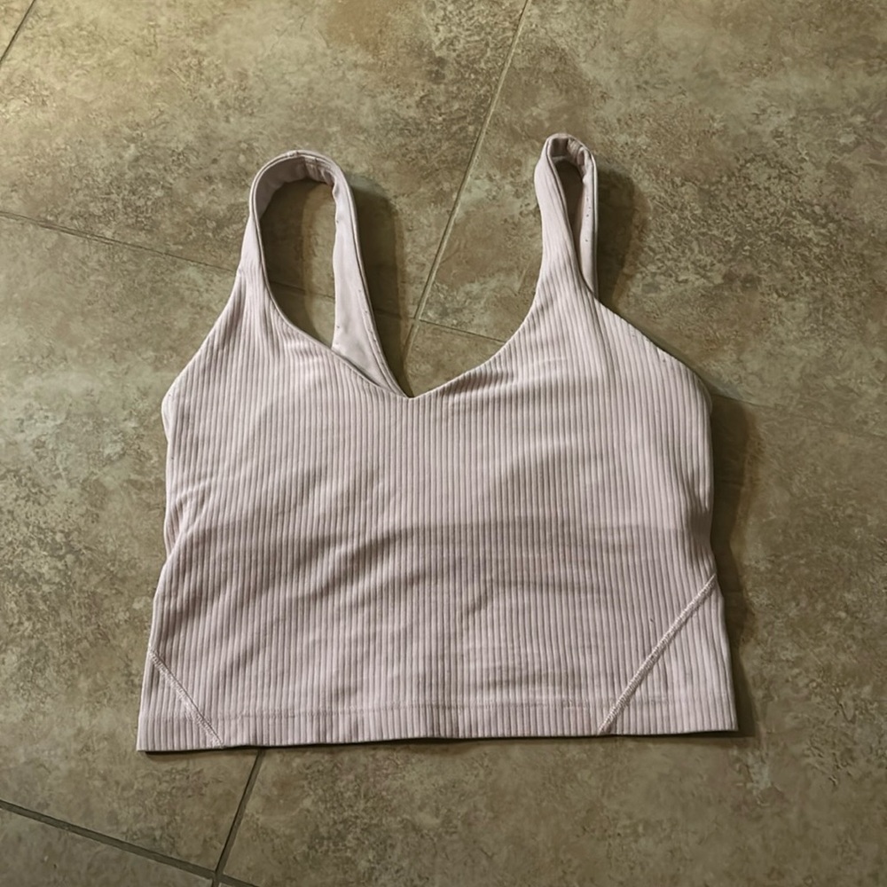 Color: strawberry milkshake
Ribbed align top
Size 2 
Original bra pads included